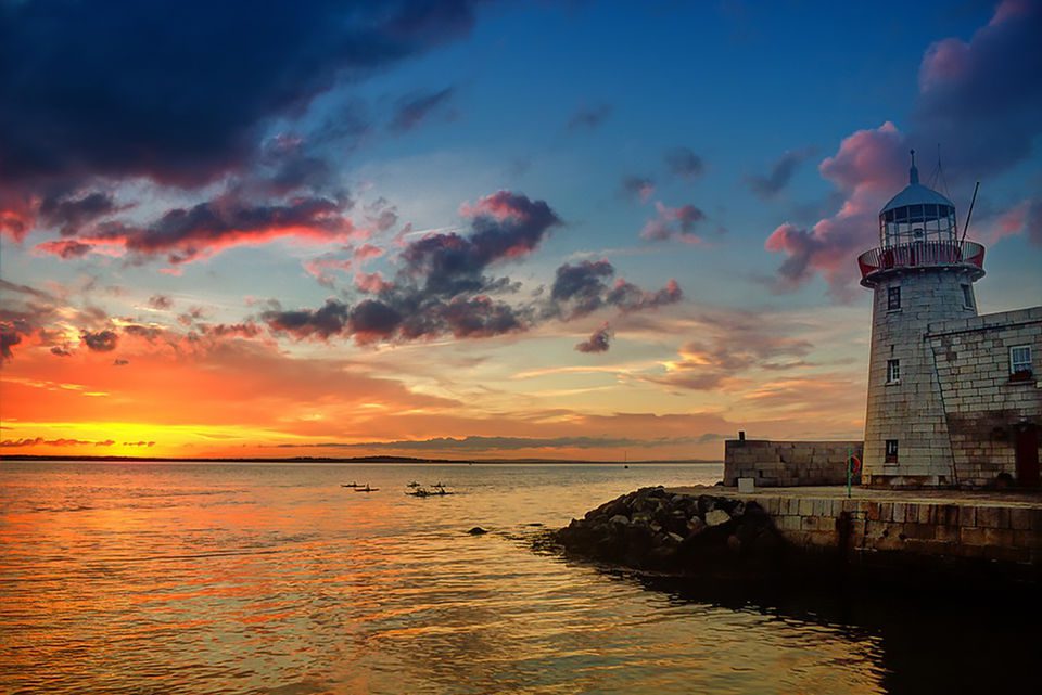 howth-sundown-cruise-historic-lighthouse-silhouetted-by-the-breathtaking-howth-sunset-at-sea-dublin-ireland