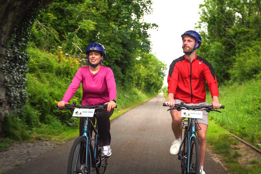 Cycling through lush green countryside on Old Rail Greenway from Mullingar. Hidden Heartlands Ireland